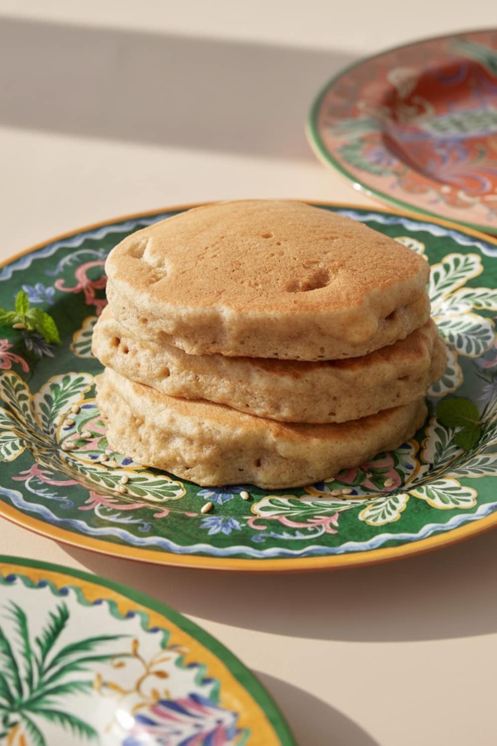 No-sugar whole grain spelt pancakes with natural banana sweetness and butter - healthy anti-inflammatory breakfast option for sustained energy without blood sugar spikes